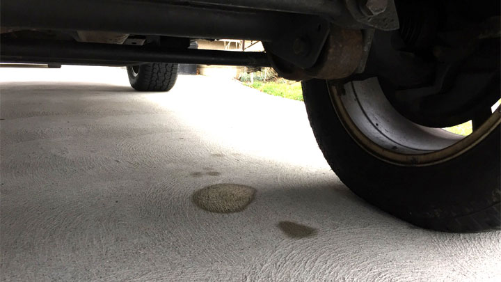 puddle of brake fluid under car