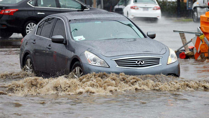 driving through flooded street