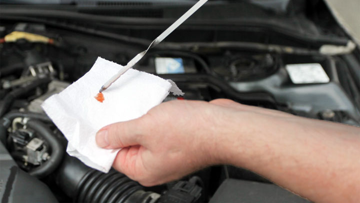 symptoms of low transmission fluid