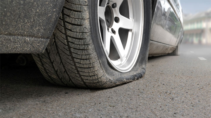 Driving on a Flat Tire (Is It EVER Okay?)