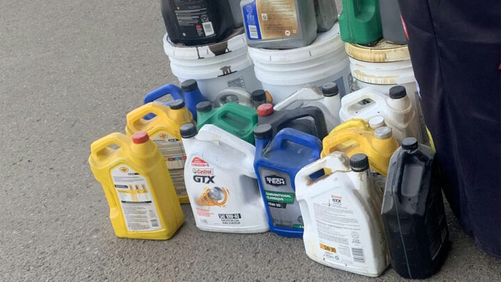 jugs of used engine oil