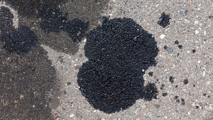 Spots of oil on the ground