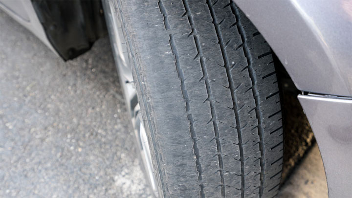 The tread on the passenger front tire is worn on the outside. What do I do?  - Quora